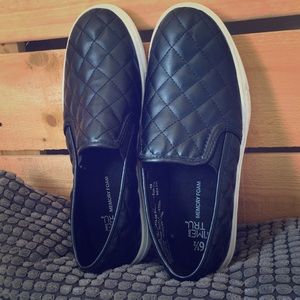 Black slip ons